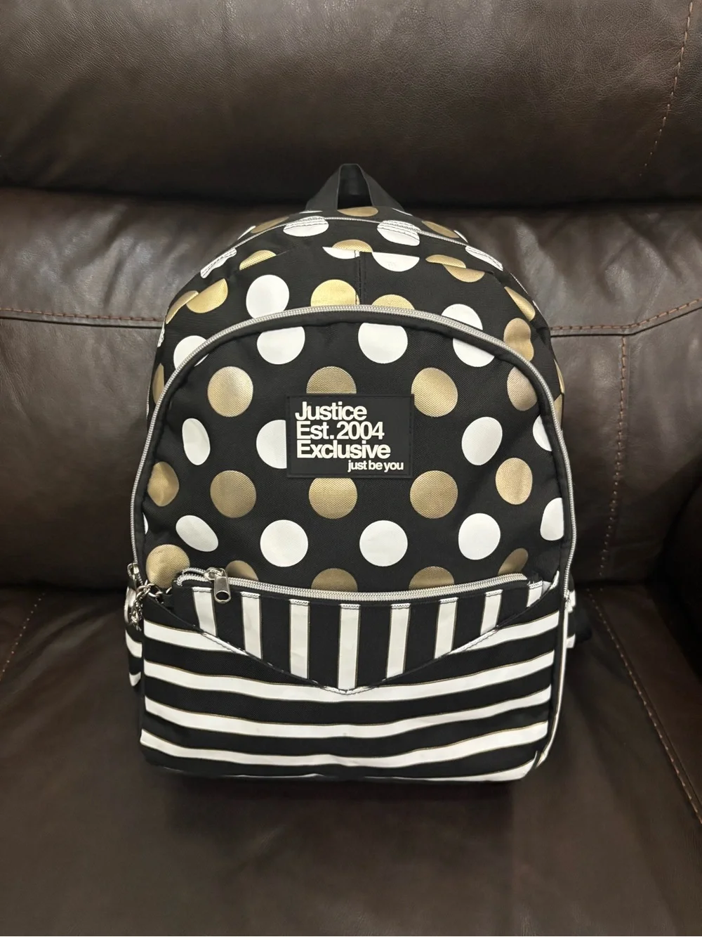 Justice Black Backpack with White and Gold Polka Dots & Stripes